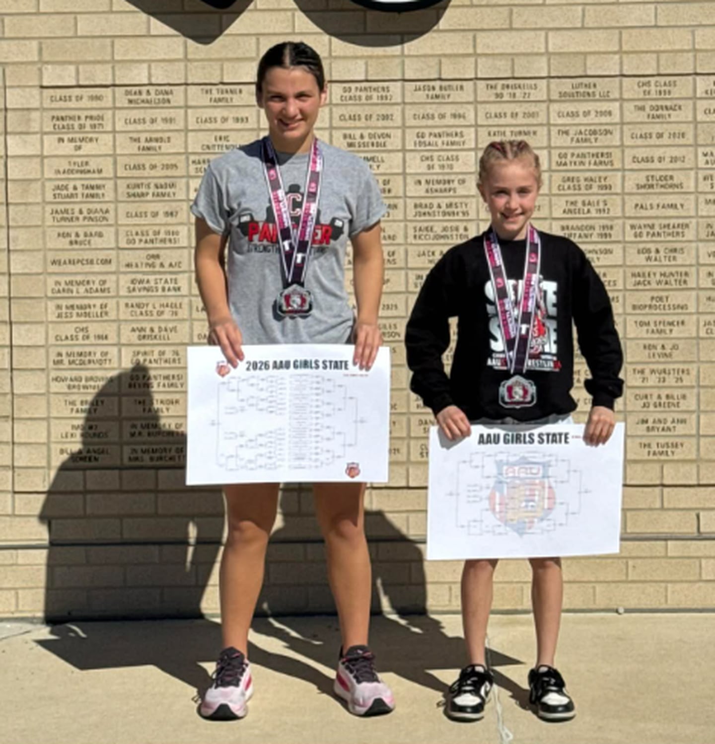 Grace Keeler and Rahzalyn Mullin, both of Creston, were gold medalists at the Iowa Girls AAU State Championships last week.