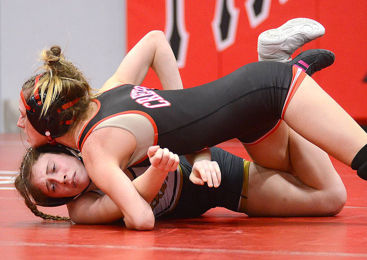 Sydney Hoffman of Creston wins by fall over Kaitlyn Glen of Eddyville-Blakesburg-Fremont in the consolation semifinals Thursday. Hoffman placed fourth in the tournament at 115 pounds.