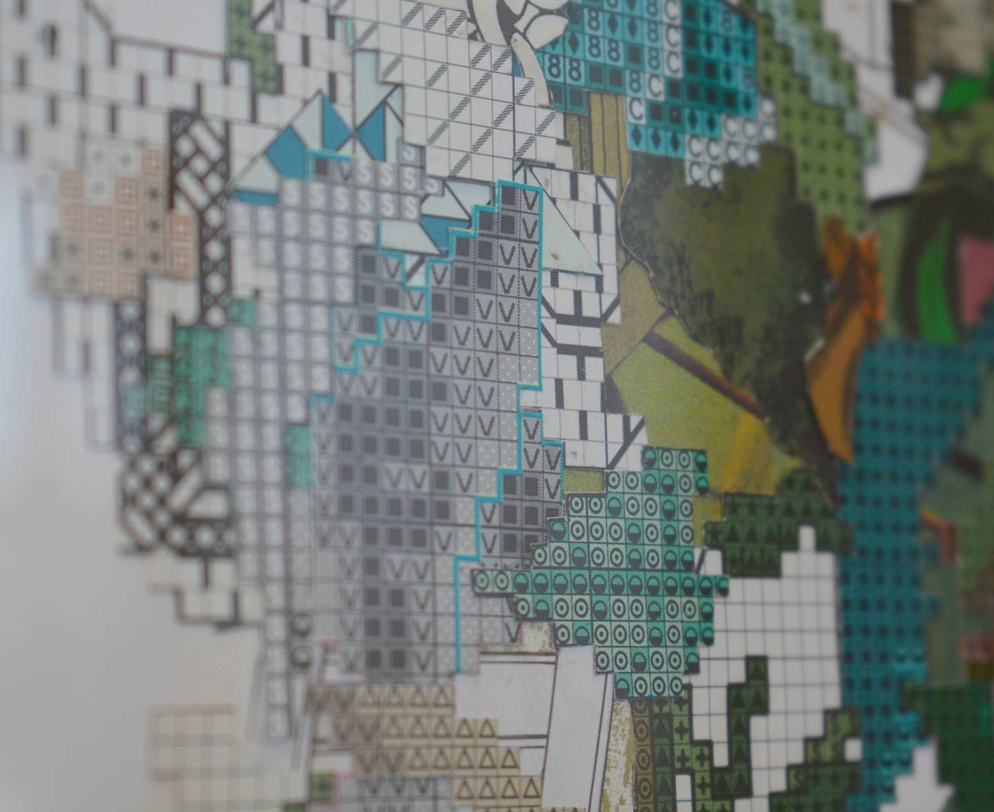 A close look at one of Reis' collages show the fine detail and texture work for each of his paper collages.