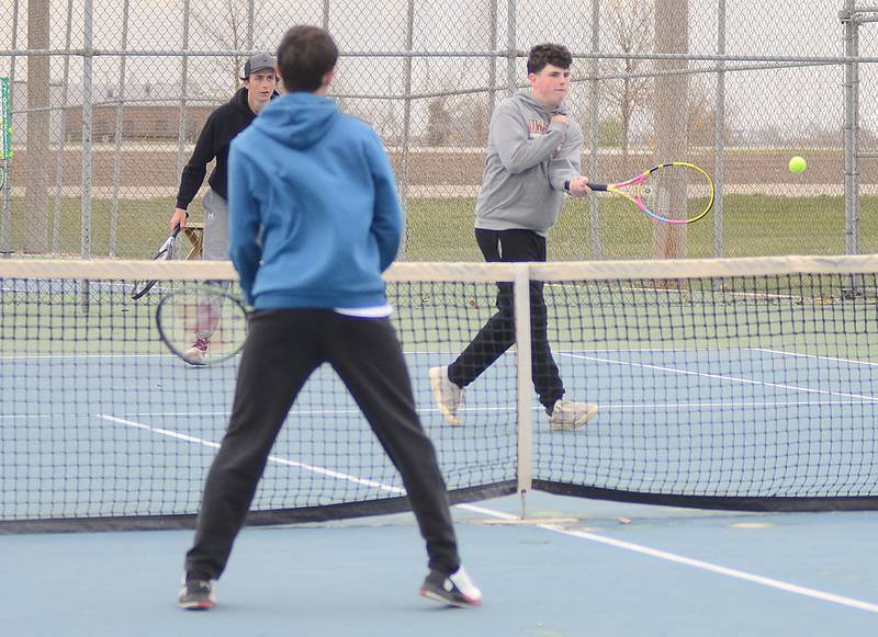 Ben Rushing of Creston returns a shot while playing No. 2 doubles with Tim Bartlett against Southwest Valley Monday. The Panther duo fell 8-2 to Brody Spark and Jordan Bruce, but both won singles matches in Creston's 5-4 dual victory.
