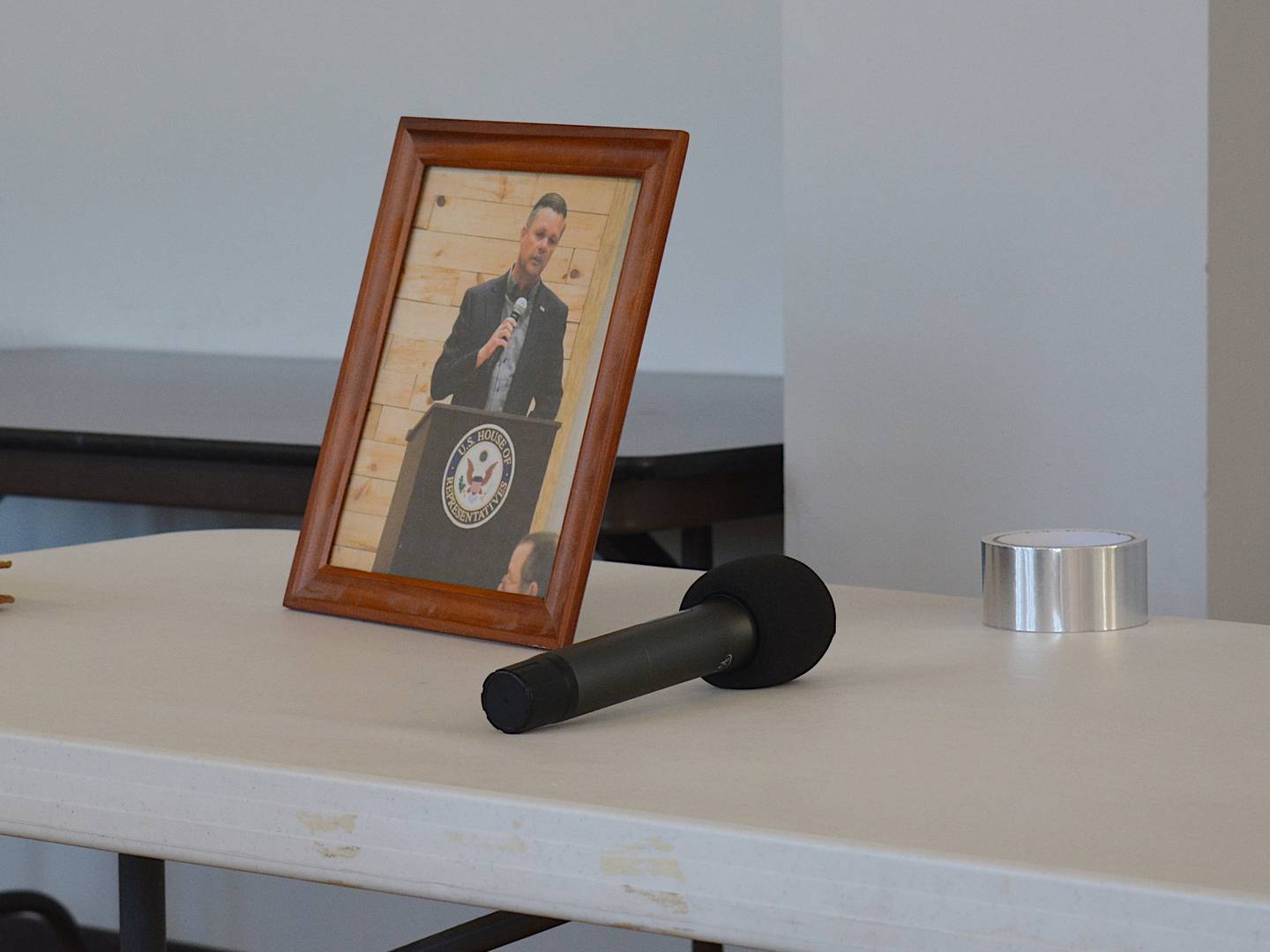Rep. Zach Nunn was a no-show for Saturday's town hall invitation, leaving a portrait and an empty chair.