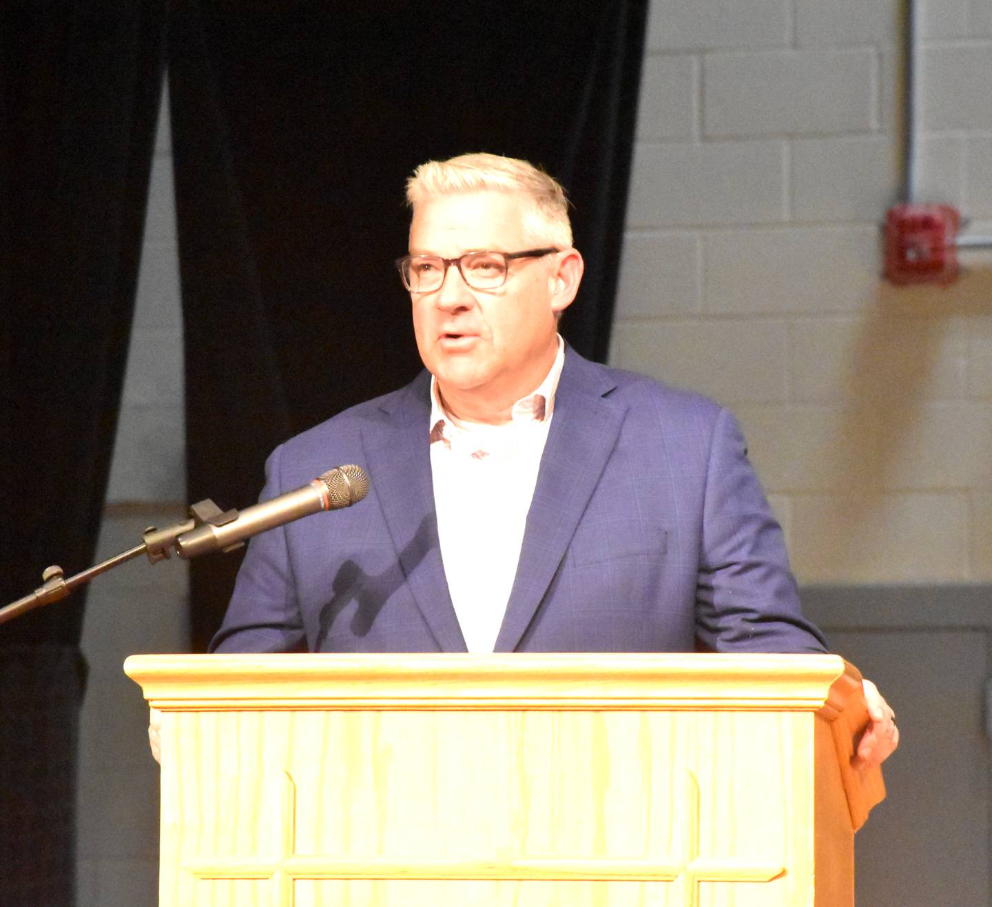 Creston High School Assistant Principal/Activities Director Scott Driskell speaks at Wednesday's service.
