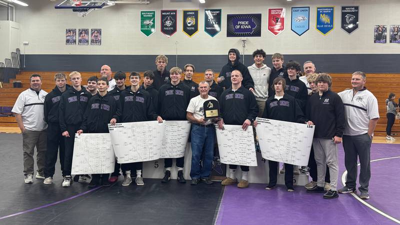 Nodaway Valley's wrestling team with tournament namesake Larry Riley Saturday, Dec. 6, at the Coach Riley Invitational.