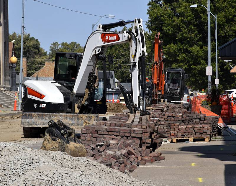 Work on upgrading water mains in the 100, 200 and 300 blocks of North Maple Street is expected to last through October. The bricks will be returned to create the street surface.