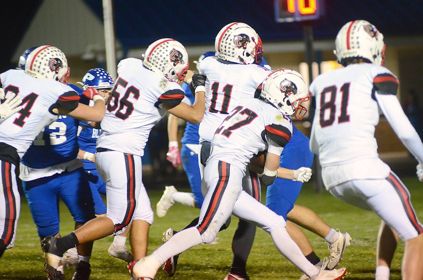 Creston running back Gabe Kaufman follows blockers for a gain at Perry Friday. Among those paving the way are Jameson McDonald (84), Michael Wofford (56), Riggins Hanson (11) and Baret Lane (81). Kaufman rushed for 138 yards.