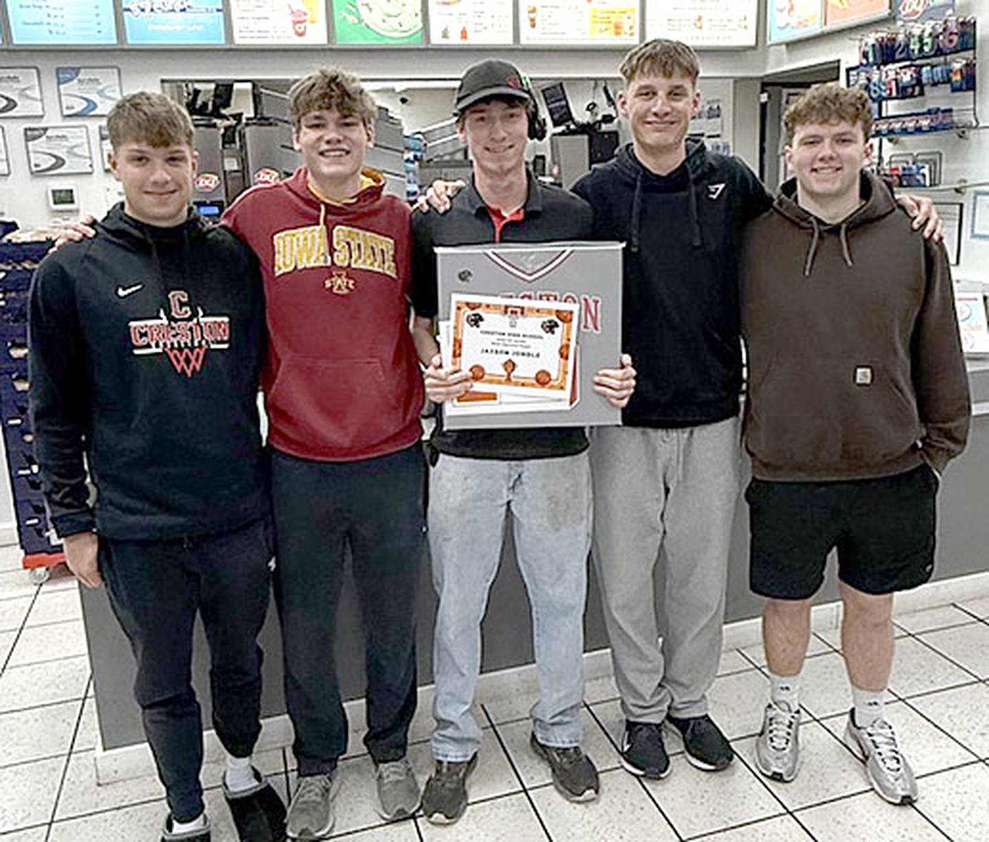 Panther senior Jaxson Jondle received his basketball awards from teammates as he was working at Dairy Queen Monday evening. Seniors shown from left are Cael Barton, Ayden Purdum, Jondle, CT Stalker and Nathan Carroll.