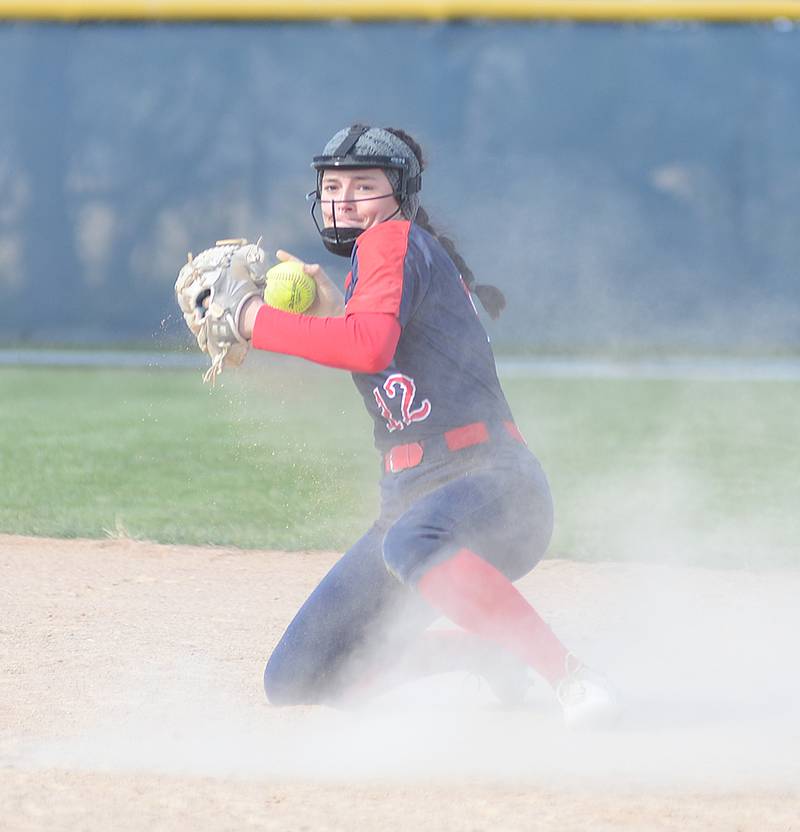 Southwestern second baseman Haley Keller throws to first base after a diving stop to snare a ground ball during Thursday's doubleheader against North Central Missouri.