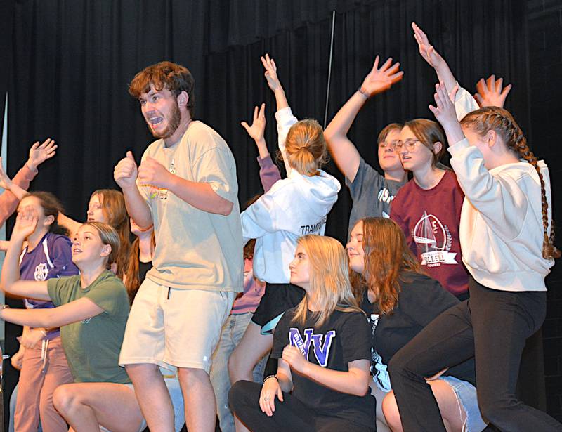 Josh Cronk, who portrays The Cat In The Hat, rehearses with the rest of the cast of "Seussical, Jr." during a practice Friday, Oct. 25.