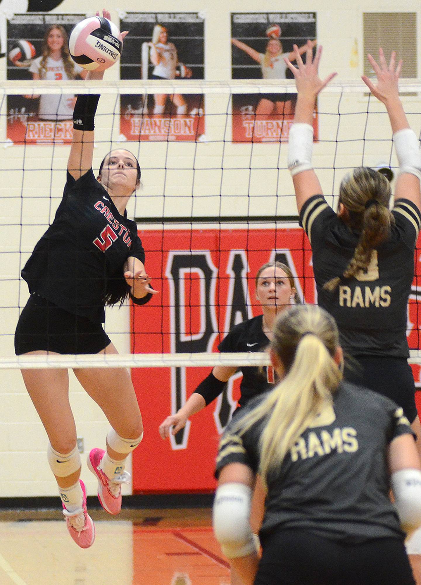 Creston's Braylee Pokorny attacks the Glenwood sideline during Thursday's match. Pokorny had six kills and a team-high three blocks.