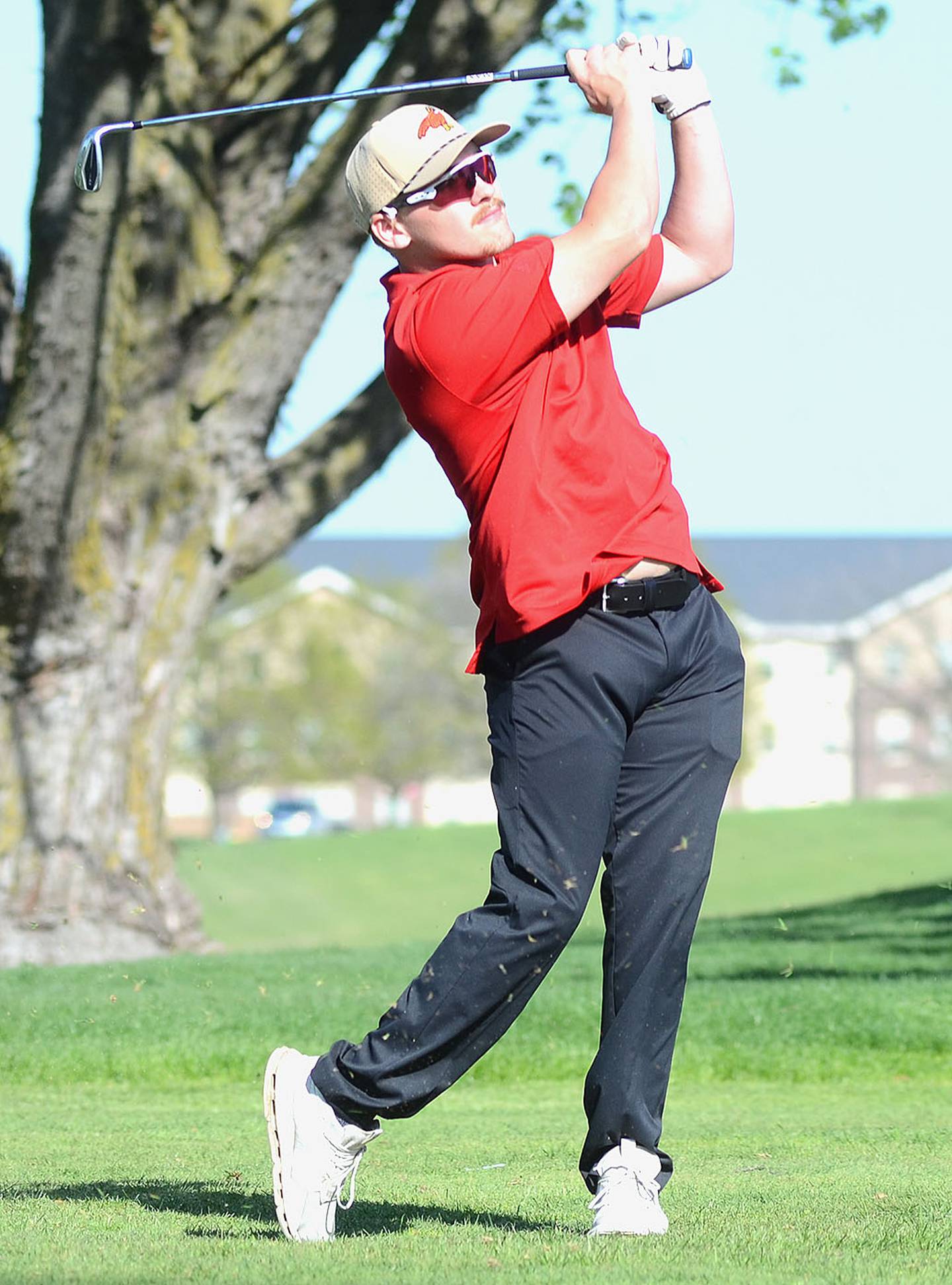 Gabe Blazek of Creston tees off on No. 6 during Monday's home meet against Shenandoah and Southwest Valley.