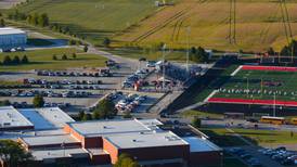 High school tennis courts planned to replace part of gravel parking lot