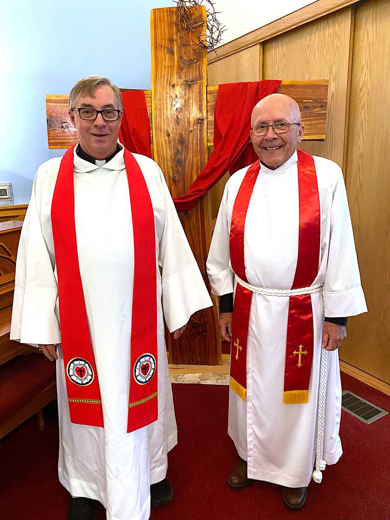 Shown with Dr. Mark Mattes from Grandview University, Pastor Tim Hummel (right) was installed Sunday, June 29 in Fontanelle as Emmanuel Lutheran Church's next pastor.