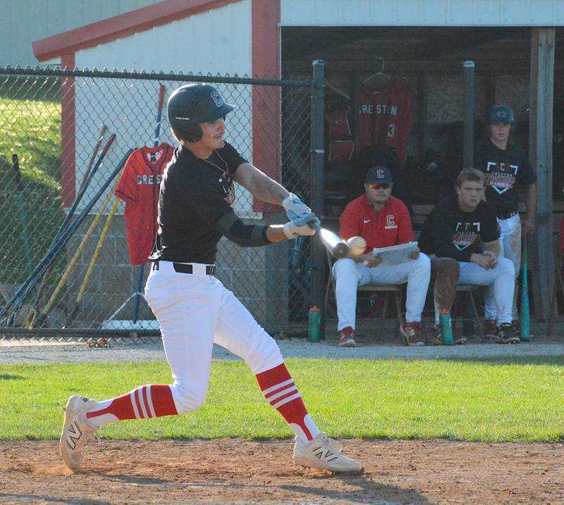 Designated hitter Camden Smith makes contact  with the ball during game one of the doubleheader against St. Albert.