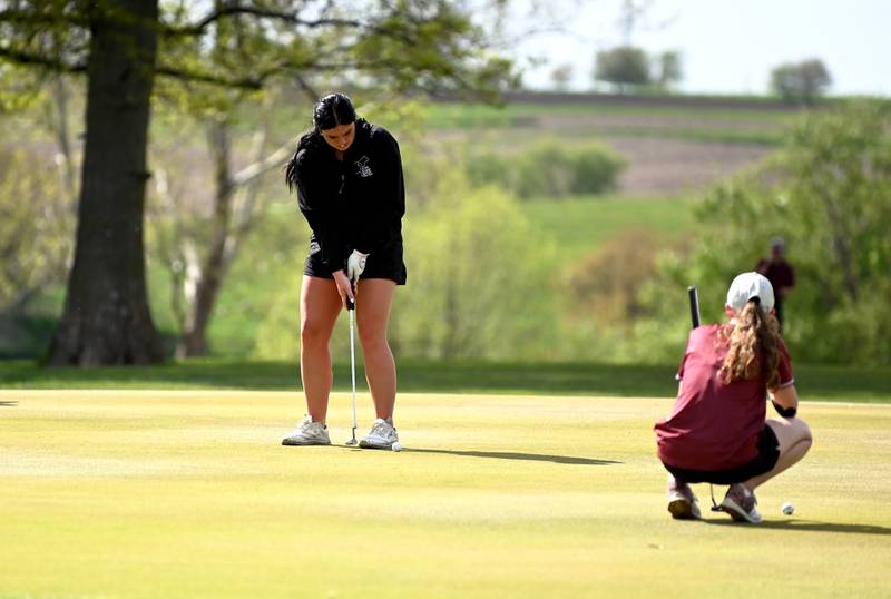 Kennedy Strider aims for the hole Tuesday in a home dual against Shenandoah.