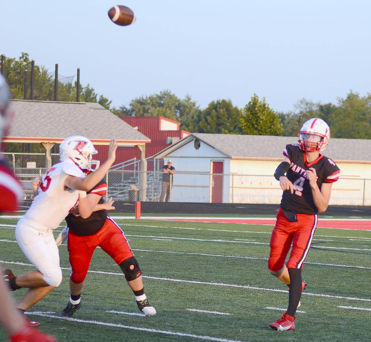 Creston quarterback Cael Turner throws downfield early in Friday's 48-28 victory. Turner completed 18 of 28 passes for 399 yards and four touchdowns.