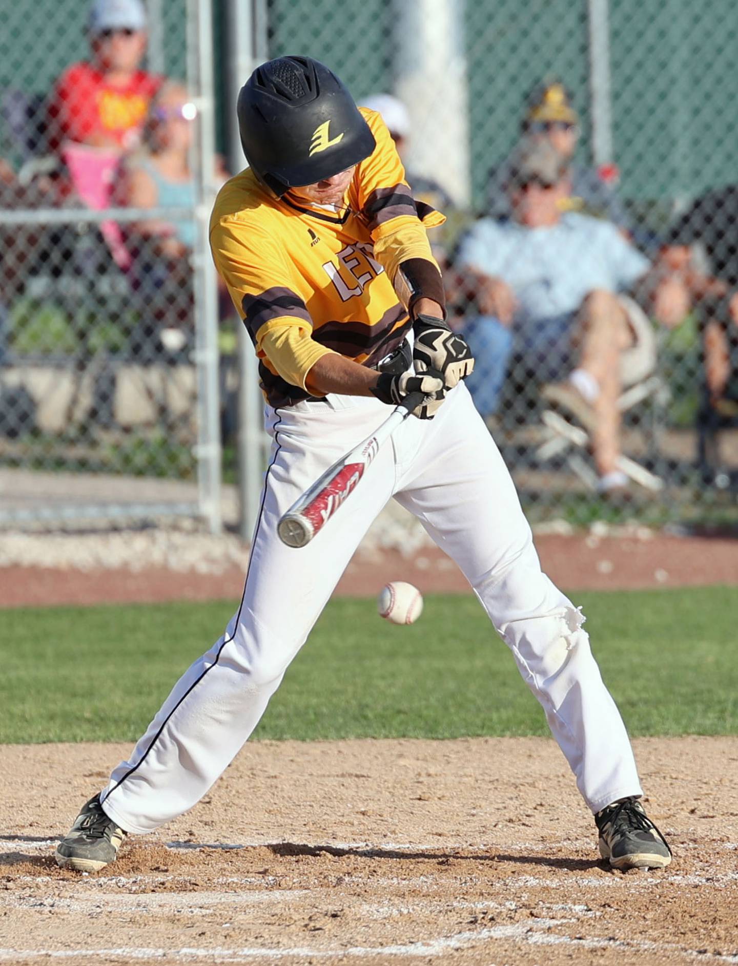 Lenox senior Rydder Hogan puts the ball in play in the second inning of the substate game against Martensdale-St. Marys in Osceola. Hogan had one of the team's four hits in the 4-0 loss.
