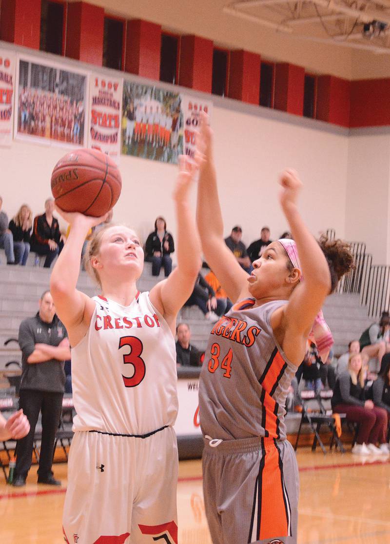 Creston's Sam Dunphy goes up for a bucket Saturday in the Panther's win over Red Oak. Dunphy had 15 points. Creston won the game on a last second shot by Brielle Baker before forcing a turnover.