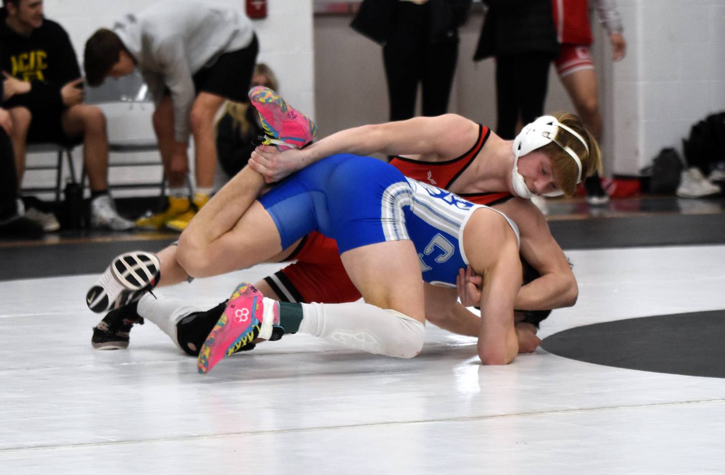 Brodrick Phelps works Kason Calhoun of CAM before winning in a 4:33 pin. Phelps went on to place sixth at 144.