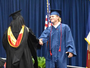 Graduates celebrate success found through change
