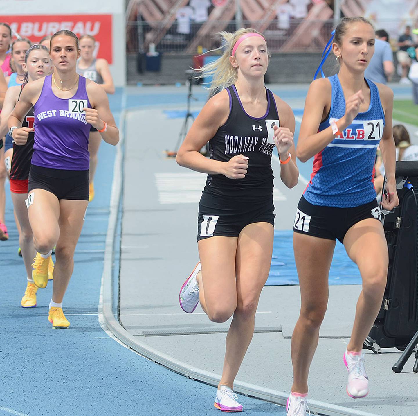 Nodaway Valley's Izzy Eisbach runs with early leader Makenna Montgomery in the Class 2A 1,500 meters Saturday. Eisbach finished 10th in 4:54.87.