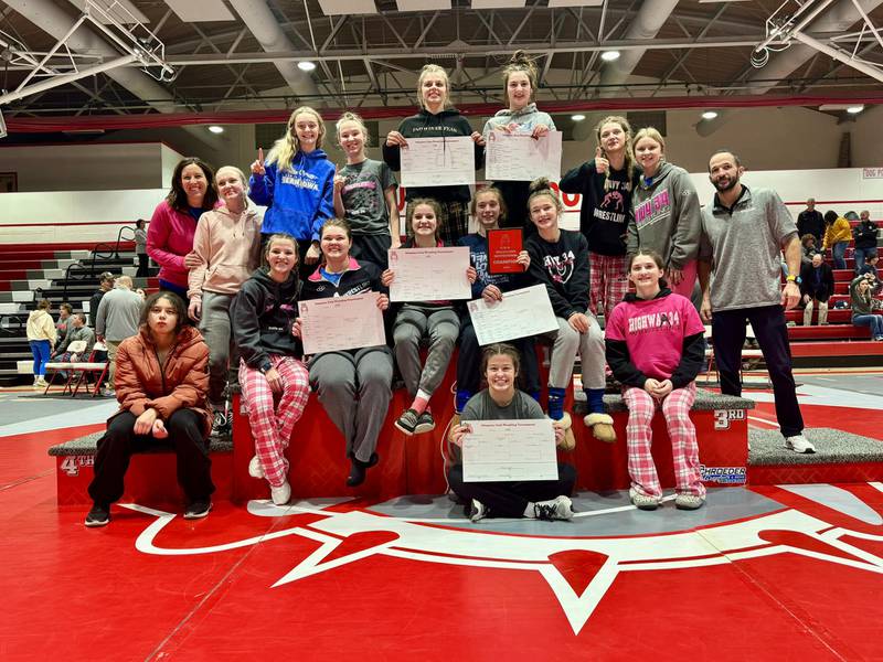 Highway 34 celebrates wins at the Ottumwa Invitational this season. They won four tournaments and had a 12-1 dual record, sending four wrestlers to the state tournament.