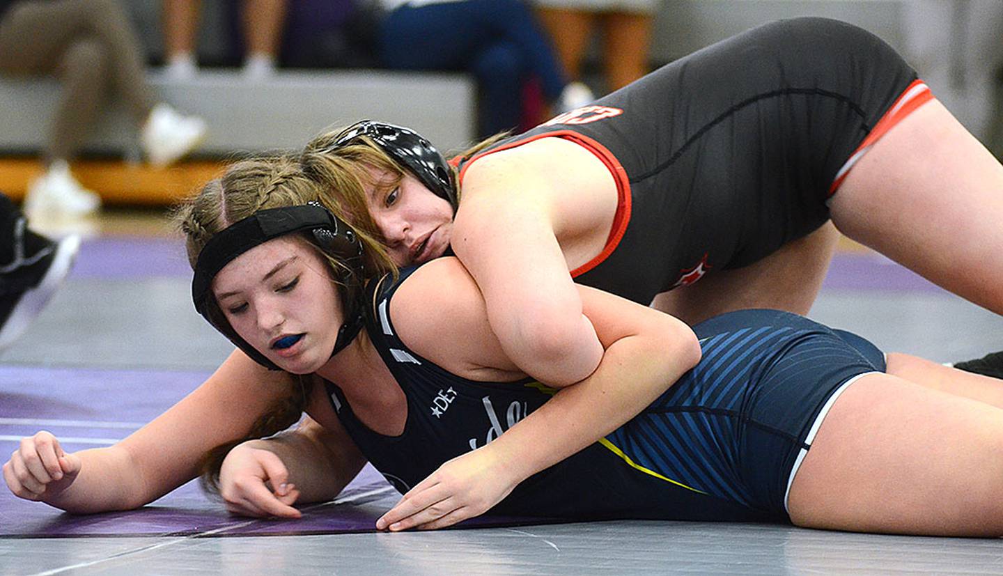Lydia Williams of Creston controls Riverside's Kaylin Garrison before winning by fall in their 170-pound consolation match Saturday. Williams placed sixth.