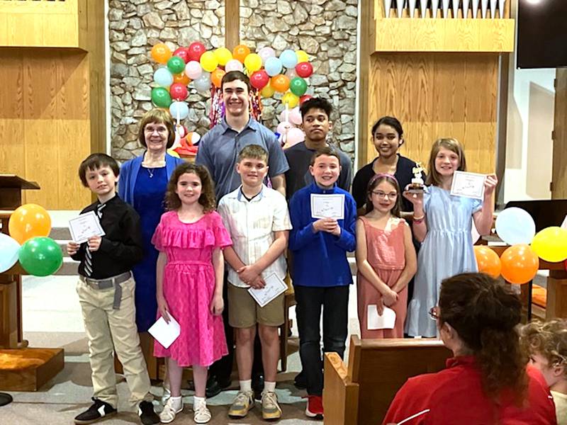 Students of Janna Nelson taking part in a piano recital Sunday, April 27 were in front from left, Ceige Underwood, Charlotte Owens, Cooper Ehrsam, Eli Nourse, Grace Nourse, Zoey Van Donselaar; back row: Nelson, Brandon Carlson, Cheribum Mercado and Michidel Mercado.