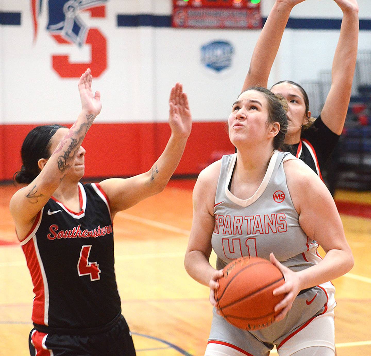 Southwestern center Mikayla Hearon powers into the lane for two of her seven points in Wednesday's 54-49 win against Southeastern.