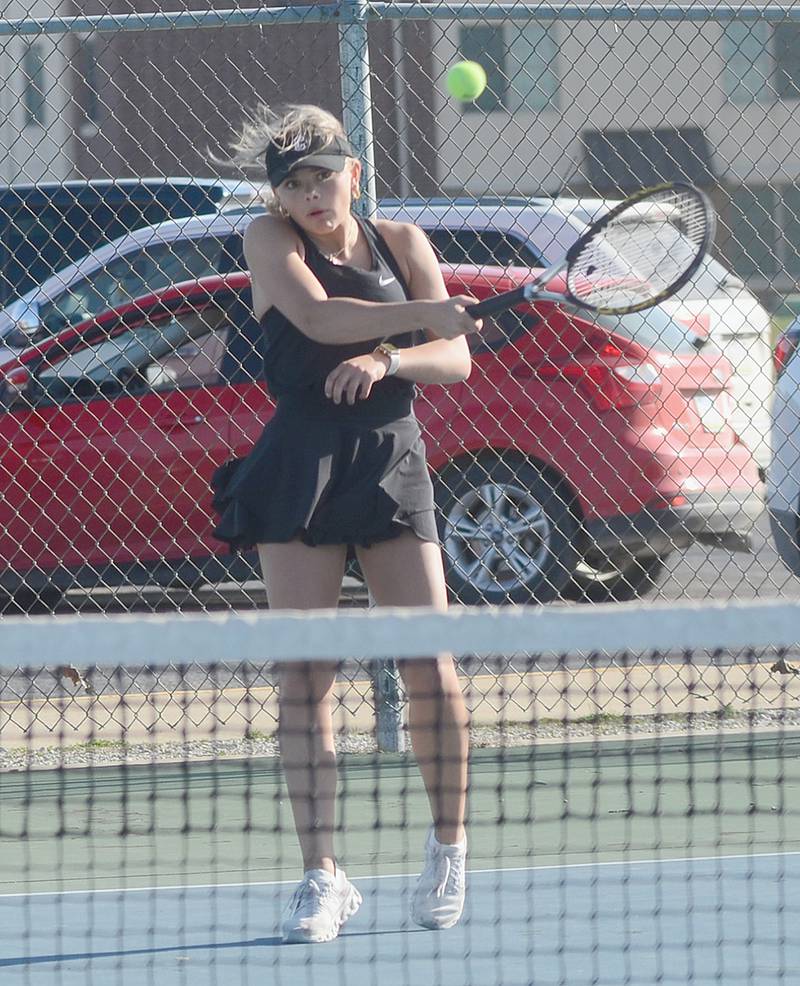 Ava Adamson of Creston concentrates on a shot against Southwest Valley's Karissa Richey Monday. Adamson won the match 9-8 on a 7-3 tiebreaker, and also won by tiebreaker at No. 2 singles on Tuesday against Clarke's Ava Hagen.