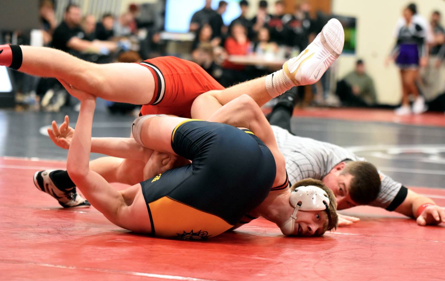 Brodrick Phelps of Creston pins Kellen Oliver of Riverside Oakland in the 138-pound third-place match.