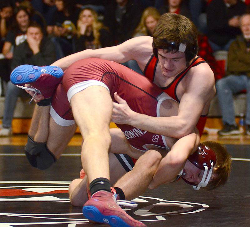 Creston 138-pounder Brandon Briley works to gain an advantage during his 11-5 victory over Shenandoah's Cole Scamman Thursday night.