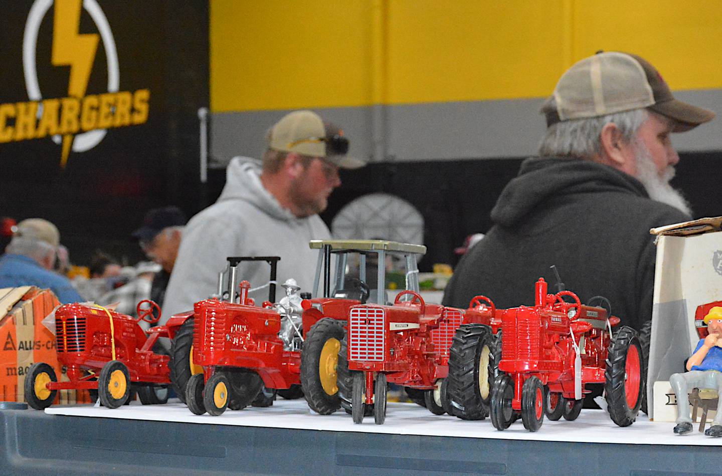 Farm toys displayed for sale at the West Central Iowa Farm Toy Show at AC/GC Middle School.