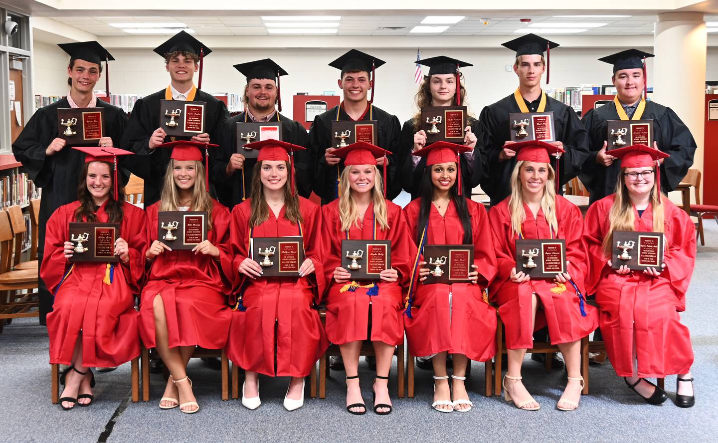 The 14 valedictorians, front row, from left: Lilly James, Lila Berning, Hollynn Rieck, Maylee Riley, Mahi Patel, Jaycee Hanson and ShyAnn Richards-Smith. Back row: Carson Beer, Ayden Purdum, Nolan Ide, Lane Travis, Kyler Hanson, Wyatt Hitz and Malachi Webber.