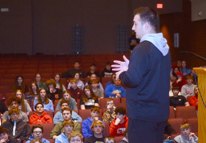 Garrison Carter, Creston special education teacher and assistant football coach, explains the new athletic enhancement physical education class to students in an assembly earlier this year. Carter taught a similar class in his previous position at ADM High School.