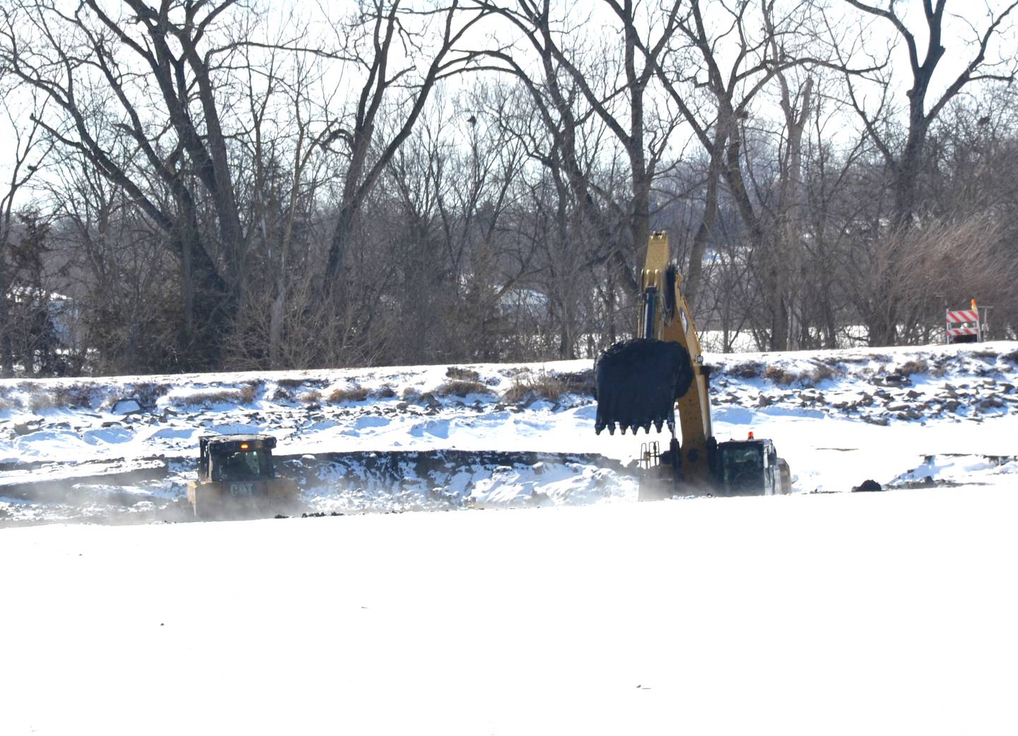 JNC Construction hard at work to dredge McKinley Lake in February.