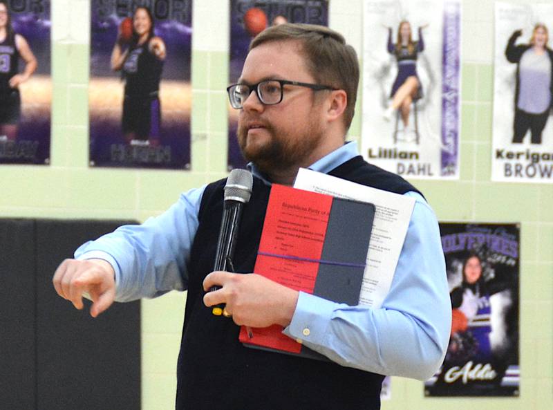 Republican Party of Adair County Chairman Ryan Frederick opens the proceedings at the 2024 caucus.