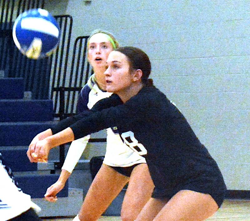 Wolverine junior Allie Cornelison focuses on a good serve receive in a match against AHSTW Sept. 2 at Griswold Community High School.