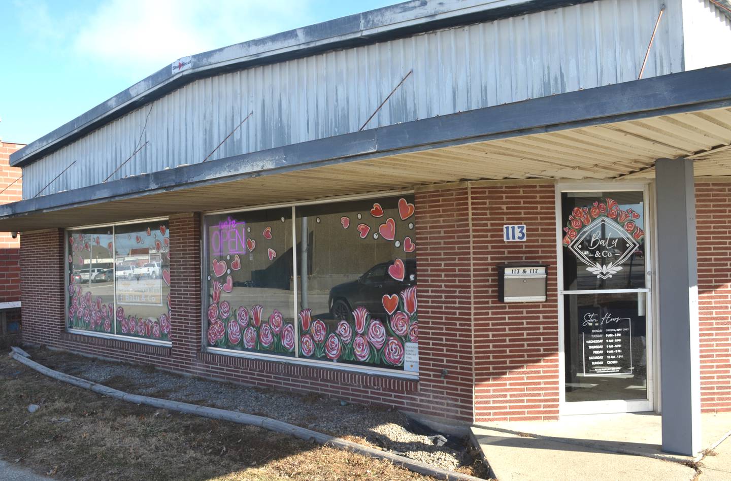 BaLu & Co. is located next to Spencer's Chophouse and Tavern on North Walnut Street.