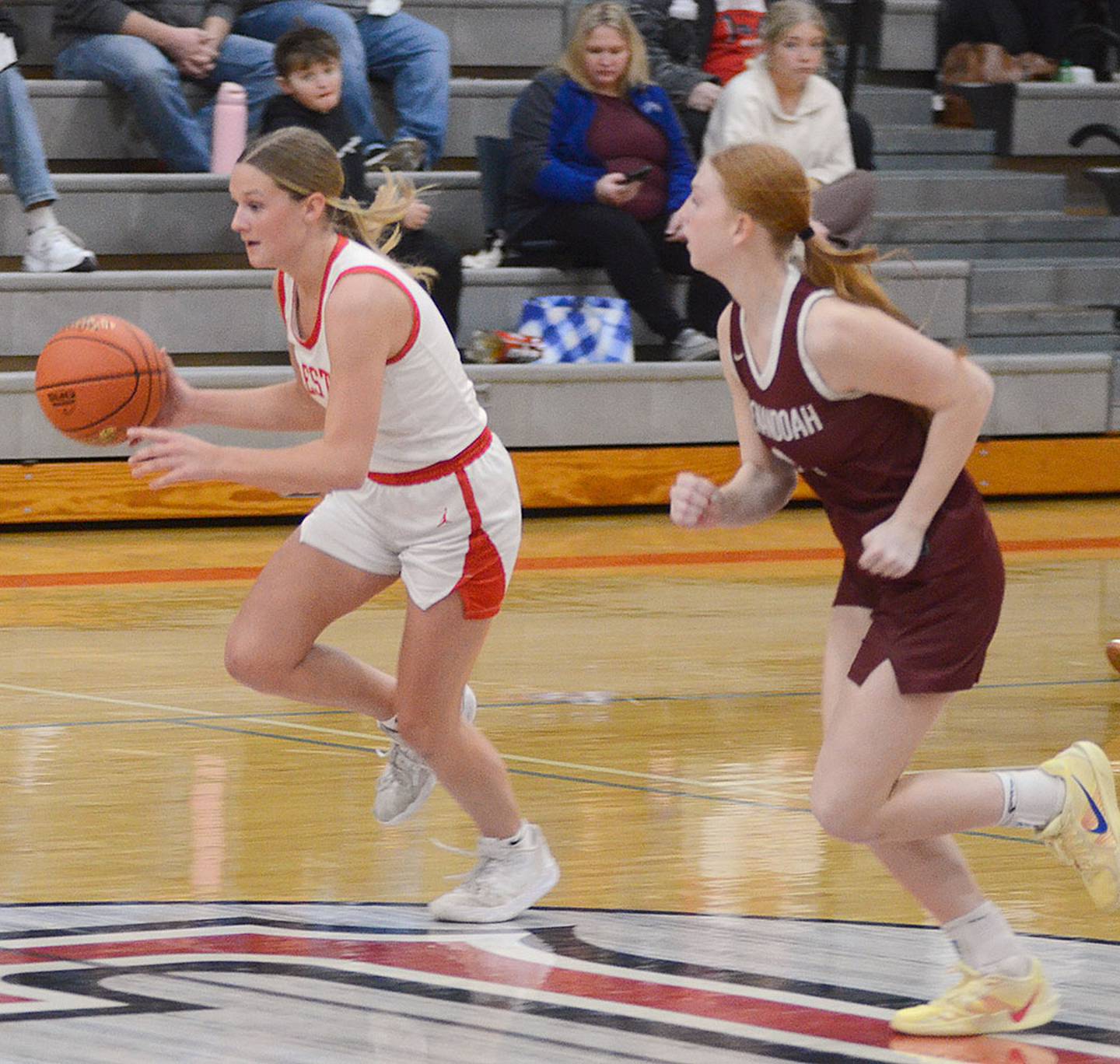 Creston's Kadley Bailey leads a Panther fast break early in Tuesday's game against Shenandoah. Bailey scored 19 of her 23 points in the first half as Creston took a 26-19 lead.