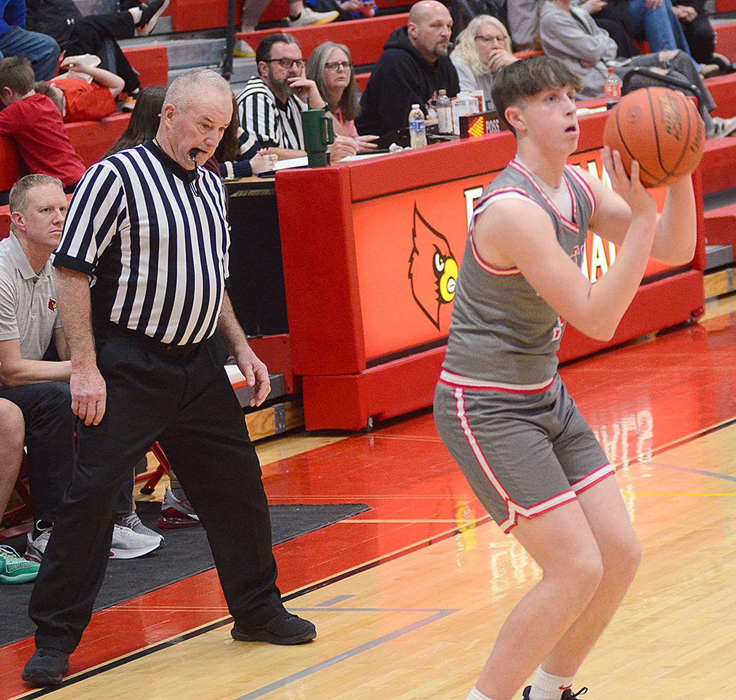 Rhett Driskell of Creston puts up a 3-point shot at Earlham Thursday. Driskell sank four 3-pointers in the second half and finished with 17 points.