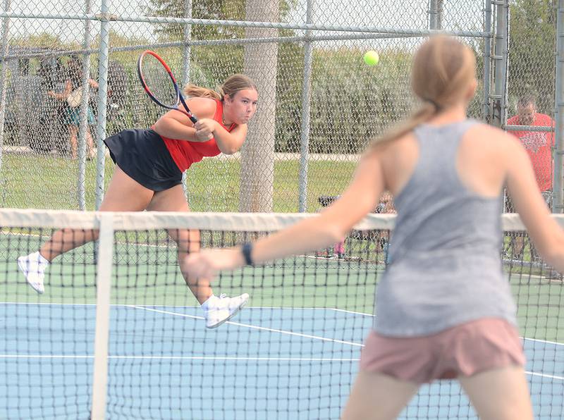 Creston's Shaylee Coen hits a passing shot against Shanntel Larrington of Chariton during her 8-1 singles victory Thursday. Coen also went 2-0 in singles and doubles in Friday's win over Audubon.