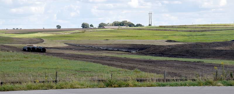 Dirt work begins on Alliant Energy's solar-power field near the intersection of Howard and Osage streets east of Creston.