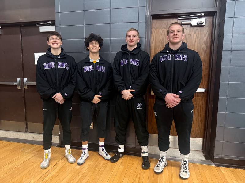 From left, seniors Ty Strode, Keyin Steeve, Matthew Nelson and Ashton Honnold before competing in three last duals on their home mats Tuesday, Jan. 13.