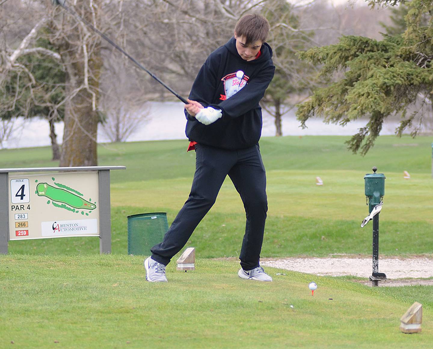 Creston freshman Branden Spencer tees off on No. 4 at Crestmoor Golf Club in Thursday's opening dual against Atlantic.