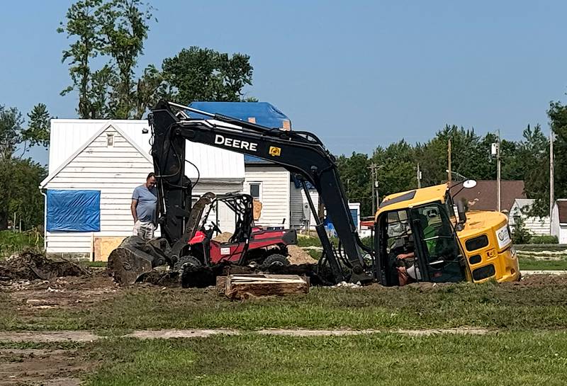 GoServ Global volunteers work on a property in Greenfield this week.