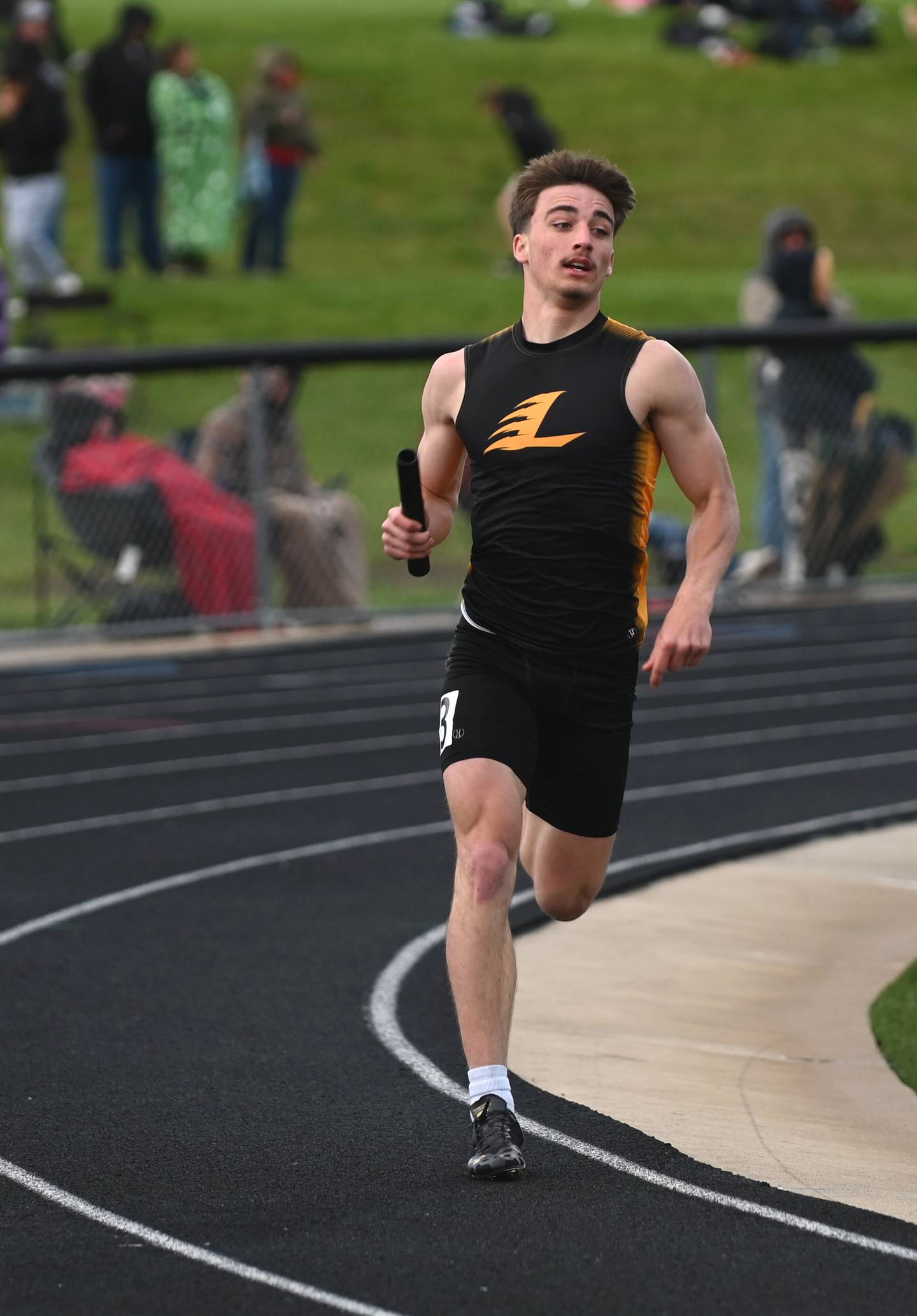 Lenox's Wylie Brokaw anchors the boys distance medley relay, the quartet finishing second.