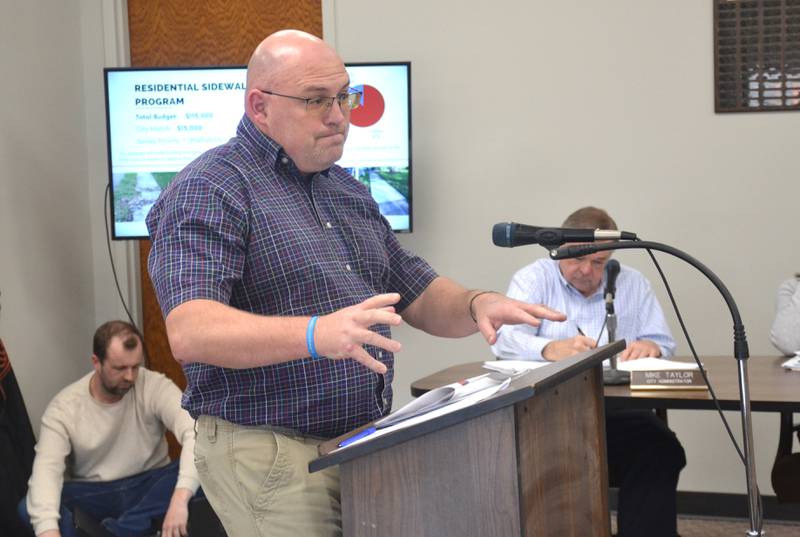 Jeremy Rounds presents the updated Neighborhood Revitalization Grant application to Creston City Council Tuesday night.