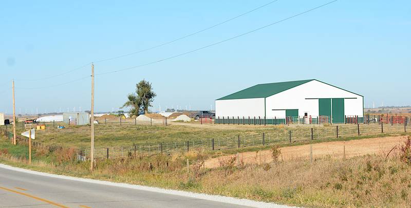 The Paul and Abbey Queck farm, where a tornado hit May 21, has one new barn, and more structures are to come.