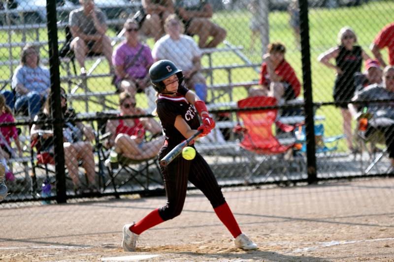 Creston’s Sasha Wurster connects for a hit Monday in game one of a doubleheader sweep of visiting Lewis Central.