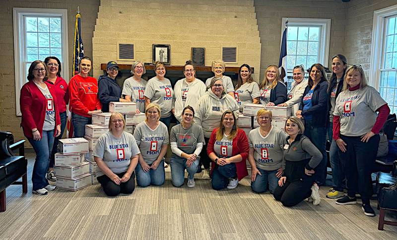 Volunteers for Blue Star Mothers' Iowa Chapter after finishing the packing for last year's care packages.